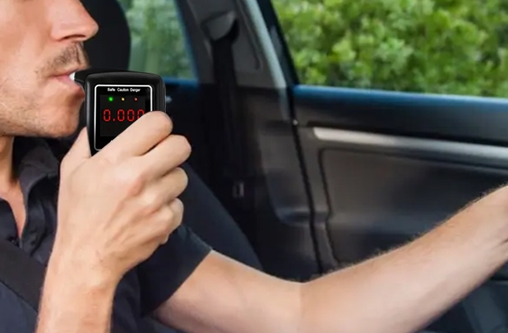 Use a handheld alcohol tester