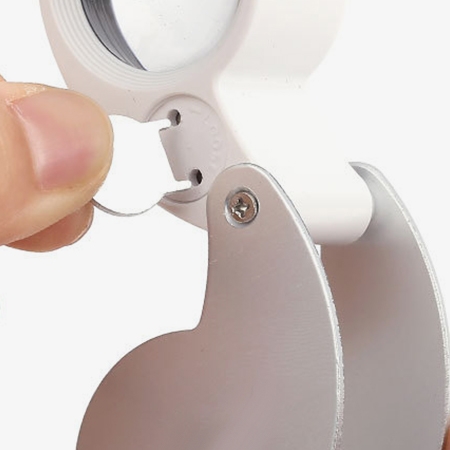 Jewelers loupe battery compartment