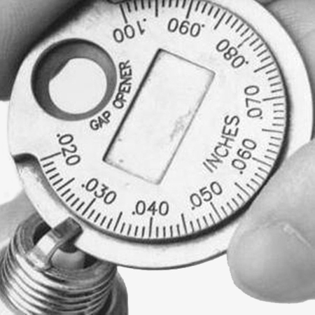 Spark plug gap coin detail